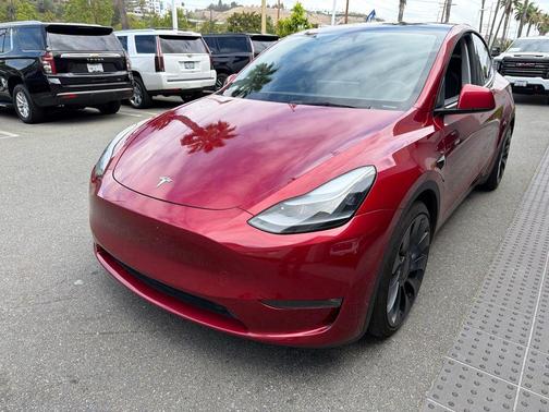Red 2025 Tesla Model Y Performance