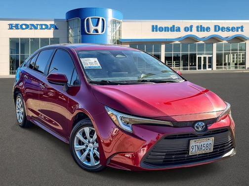 Ruby Flare Pearl 2025 Toyota Corolla Hybrid LE