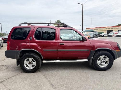 Molten Lava Clearcoat Metallic 2003 Nissan Xterra XE