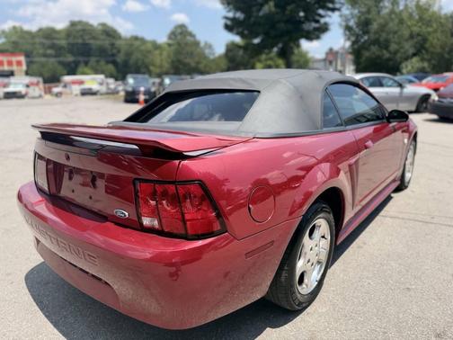 Red 2004 Ford Mustang Deluxe