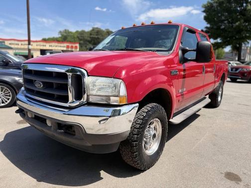 Red 2003 Ford F-250 Lariat