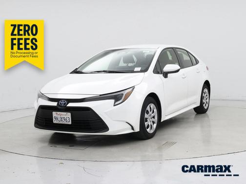 White 2023 Toyota Corolla Hybrid LE