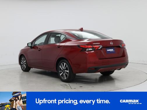 Red 2025 Nissan Versa SV