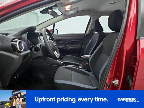 Red 2024 Nissan Versa SV