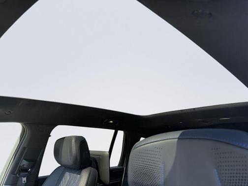 Black Cherry Tintcoat 2026 Cadillac Escalade IQ Sport