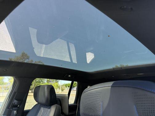 Black Cherry Tintcoat 2026 Cadillac Escalade IQ Sport