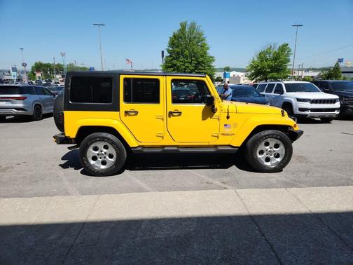 Baja Yellow Clearcoat 2015 Jeep Wrangler Unlimited Sahara