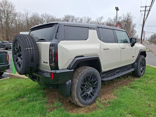 Tan 2026 GMC HUMMER EV SUV 2X