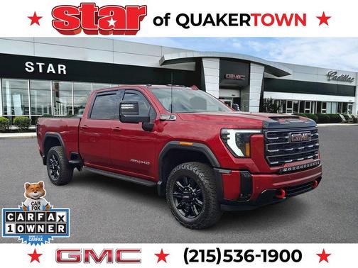 Volcanic Red 2025 GMC Sierra 2500 AT4