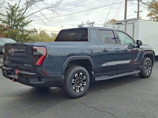 Blue 2026 GMC Sierra EV Elevation