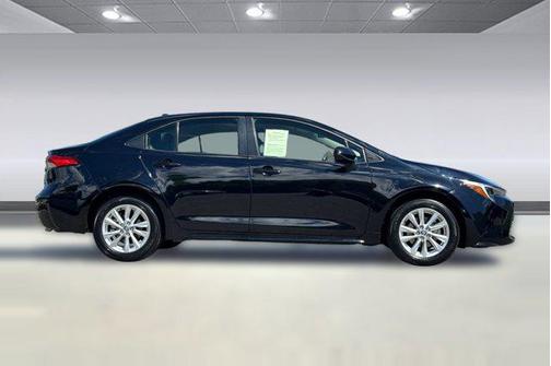 Midnight Black Metallic 2025 Toyota Corolla Hybrid LE