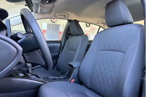 Midnight Black Metallic 2025 Toyota Corolla Hybrid LE