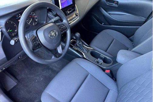 Midnight Black Metallic 2025 Toyota Corolla Hybrid LE