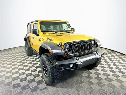 Yellow 2026 Jeep Wrangler Sport