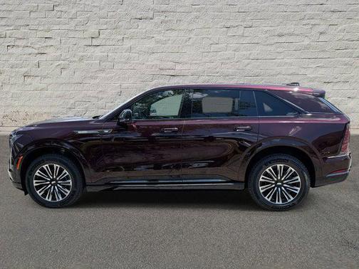 Black Cherry Tintcoat 2026 Cadillac Escalade IQ Sport