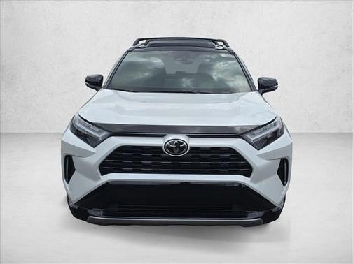 Wind Chill Pearl/Midnight Black Metallic 2025 Toyota RAV4 Hybrid SE