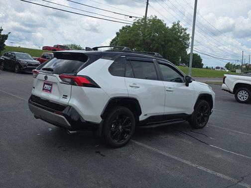 Wind Chill Pearl/Midnight Black Metallic 2025 Toyota RAV4 Hybrid SE