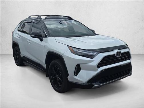 Wind Chill Pearl/Midnight Black Metallic 2025 Toyota RAV4 Hybrid SE