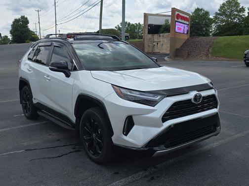 Wind Chill Pearl/Midnight Black Metallic 2025 Toyota RAV4 Hybrid SE