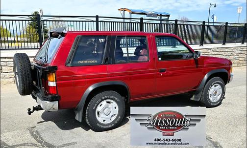 Red 1993 Nissan Pathfinder XE 4-door 4WD
