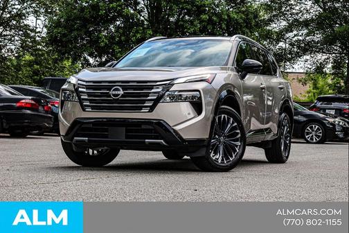 Champagne Silver Metallic/Super Black 2025 Nissan Rogue Platinum