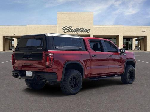 Volcanic Red Tintcoat 2024 GMC Sierra 1500 AT4X