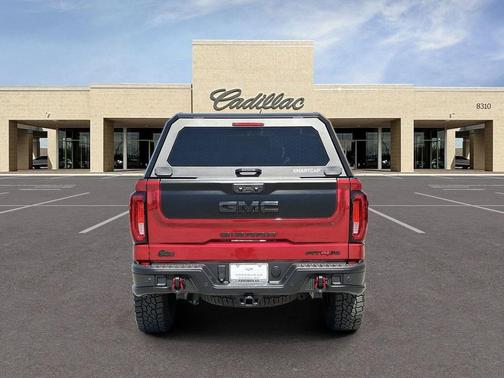 Volcanic Red Tintcoat 2024 GMC Sierra 1500 AT4X