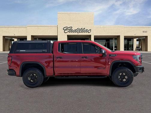 Volcanic Red Tintcoat 2024 GMC Sierra 1500 AT4X