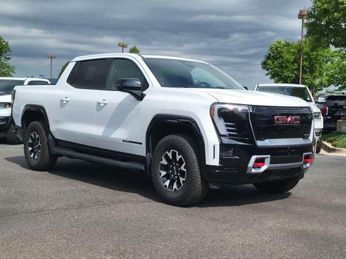 Summit White 2026 GMC Sierra EV Max Range AT4