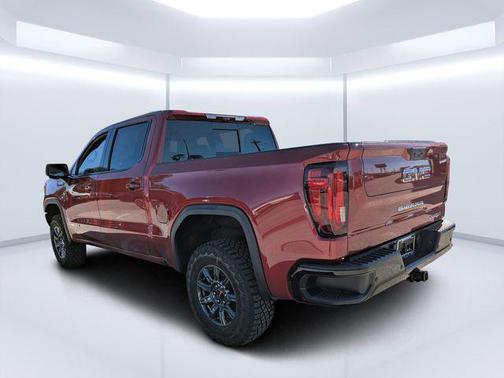 Volcanic Red Tintcoat 2026 GMC Sierra 1500 AT4X
