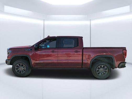Volcanic Red Tintcoat 2026 GMC Sierra 1500 AT4X