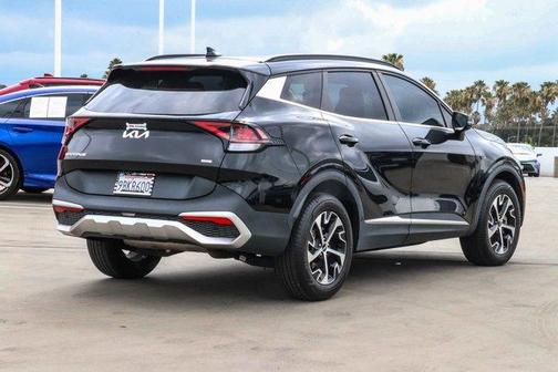 Fusion Orange 2023 Kia Sportage Hybrid EX