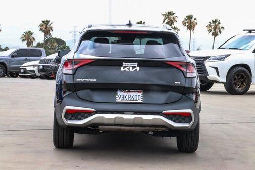 Fusion Orange 2023 Kia Sportage Hybrid EX
