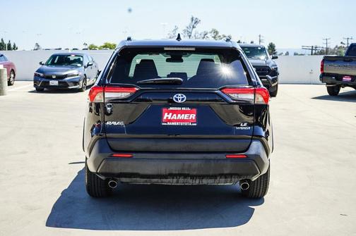 Midnight Black Metallic 2024 Toyota RAV4 Hybrid LE