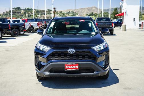 Midnight Black Metallic 2024 Toyota RAV4 Hybrid LE