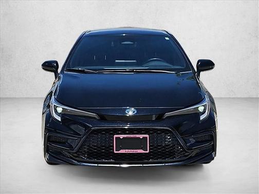 Midnight Black Metallic 2025 Toyota Corolla Hybrid SE