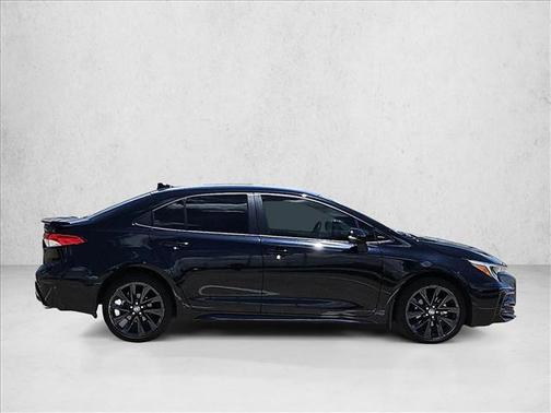 Midnight Black Metallic 2025 Toyota Corolla Hybrid SE