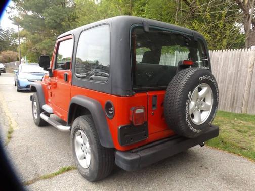 Red 2004 Jeep Wrangler X