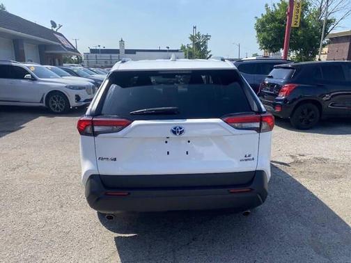 Super White 2019 Toyota RAV4 Hybrid LE