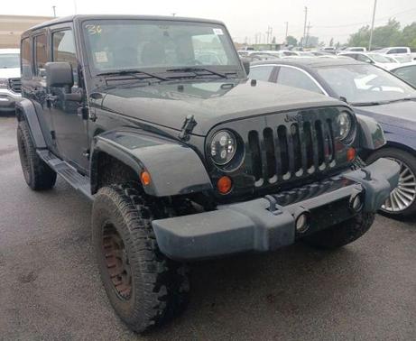 Black 2012 Jeep Wrangler Unlimited Sahara