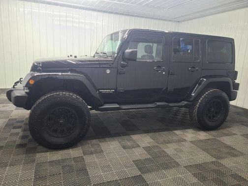 Black 2012 Jeep Wrangler Unlimited Sahara
