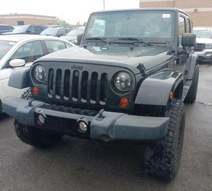 Black 2012 Jeep Wrangler Unlimited Sahara