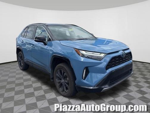 Cavalry Blue/Midnight Black Metallic 2023 Toyota RAV4 Hybrid XSE