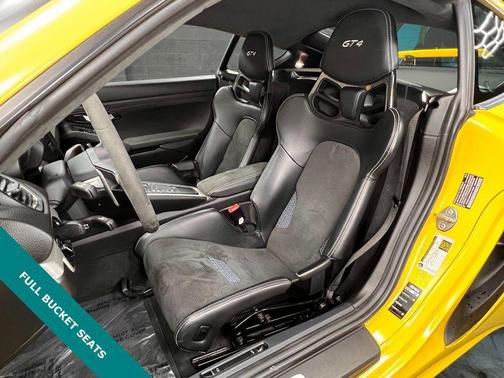 Racing Yellow 2023 Porsche 718 Cayman GT4