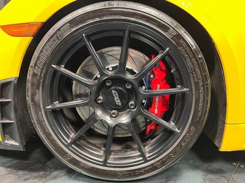 Racing Yellow 2023 Porsche 718 Cayman GT4