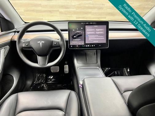 Solid Black 2025 Tesla Model Y Performance Dual Motor All-Wheel Drive