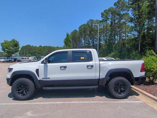 Bright White Clearcoat 2025 RAM 1500 RHO Crew Cab 4x4 5'7' Box