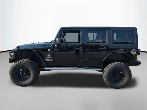 Black Clearcoat 2012 Jeep Wrangler Unlimited Sahara