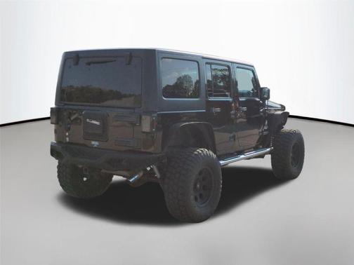 Black Clearcoat 2012 Jeep Wrangler Unlimited Sahara