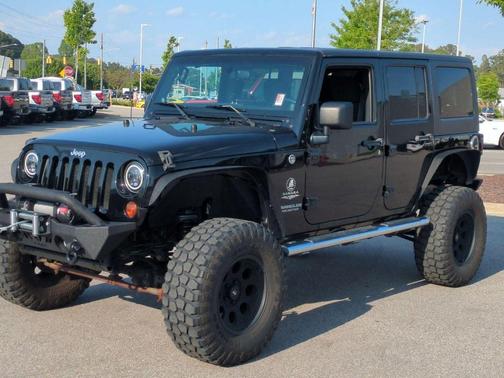 Black Clearcoat 2012 Jeep Wrangler Unlimited Sahara